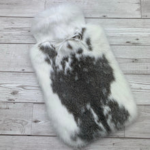 Photo of a brown and white luxury hot water bottle 155-1