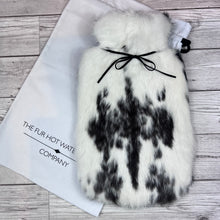 Nothing says I love you like a warm hug! Real Fur Hot Water Bottle | £175